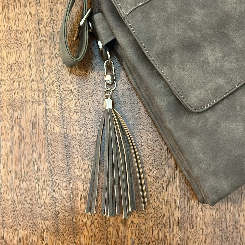 Faux Suede Crossbody bag with Open Pockets and Zip Closure Pockets